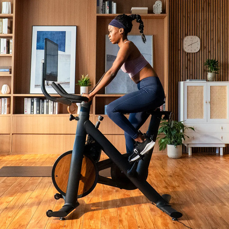 a housewife rides freebeat black exercise bike lit bike
